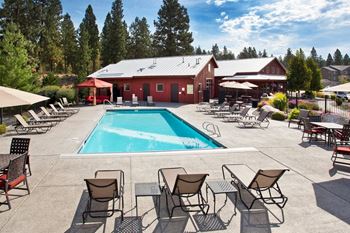 Pine valley ranch apartments spokane, washington pool area and lounge chairs
